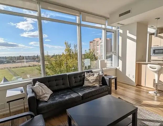 Furnished 2 bedroom 2 bath Bright Corner Condo Century Park with Sunset View | 2612 109 St NW, Edmonton - Photo 1