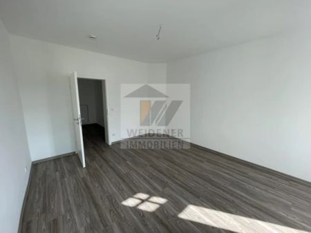 Erstbezug nach Sanierung! 4-Raum-Maisonettewohnung mit Balkon und Terrasse ins Grüne! - Photo 4