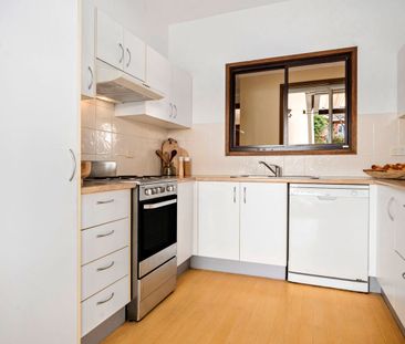 Waterfront Family Living with Tranquil Views & Spacious Split-Level... - Photo 5