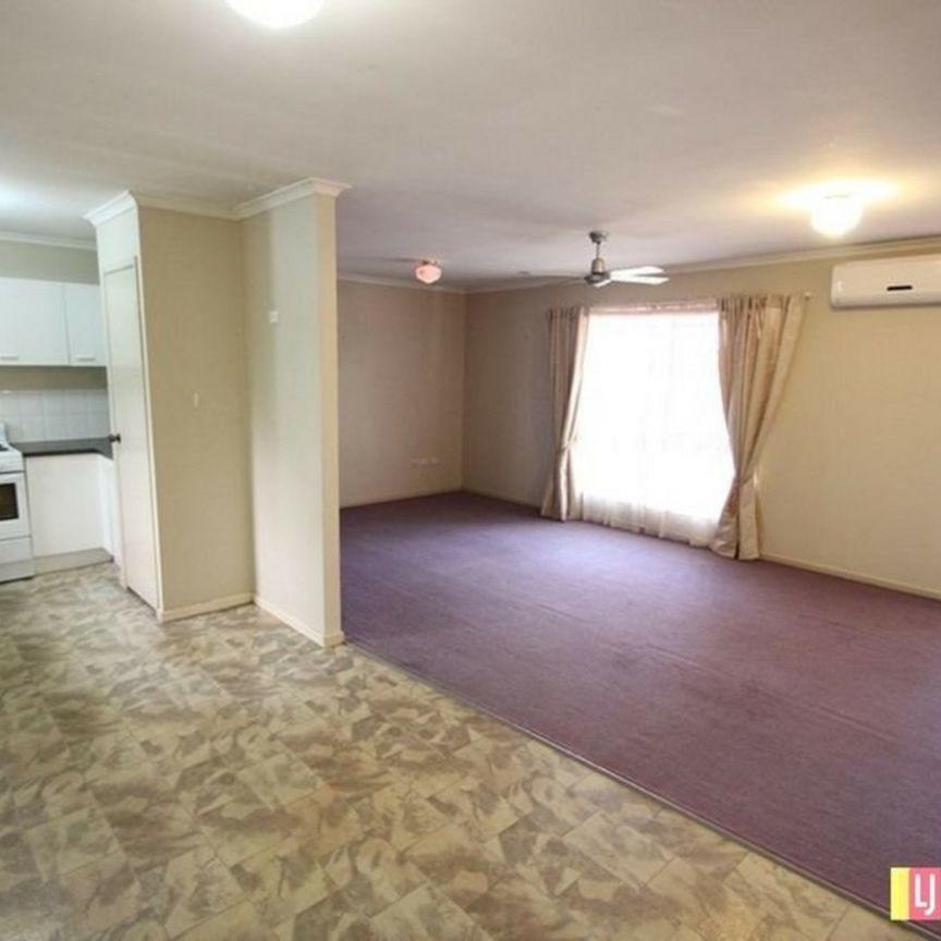Spacious Family Home with Multiple Living Areas and a Large Backyard! - Photo 1