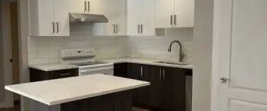 Spacious, Modern 2 Bedroom Apartment in desirable Crescent Height | 1423 1 Street Northeast, Calgary - Photo 1