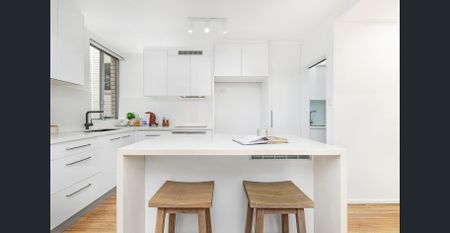 Renovated Three-Bedroom Retreat in Ultra Convenient Location Moments from Everything - Photo 4