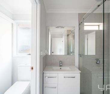 Freshly Renovated - Low Maintenance Living in Convenient Location - Photo 3