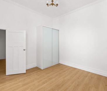 Light-filled apartment in vibrant village setting - Photo 1