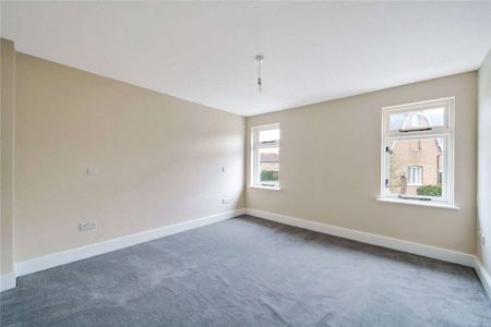 A beautifully presented three bedroom character property in a prominent central village location. - Photo 4