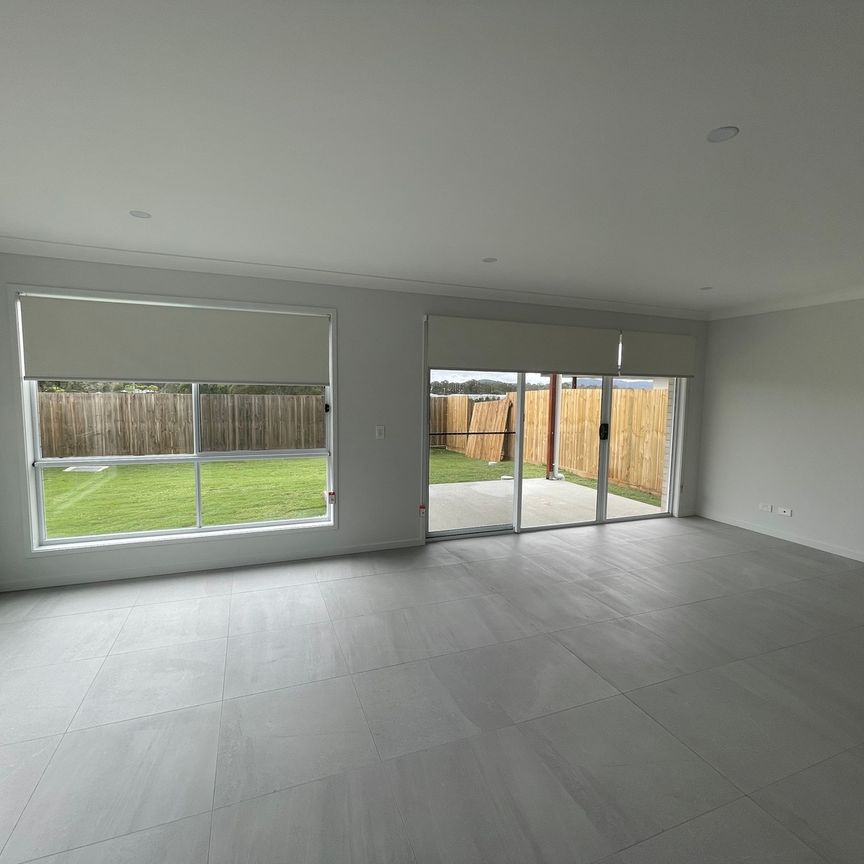 12 Bittenbinder Avenue, Logan Reserve QLD 4133 - House For Rent | Domain - Photo 1