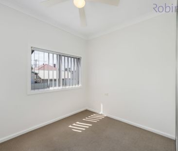 Freshly painted three bedroom home with air-conditioned living spac... - Photo 2