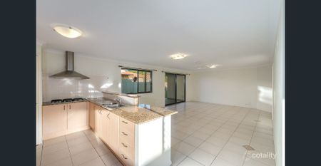 Versatile Family Living – 3 Bedrooms + Study or Optional 4th Bedroom Home in Sought after Molendinar - Photo 4