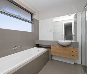 Modern & Low-Maintenance Townhouse for Rent! - Photo 1