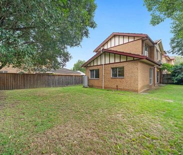 Dual level townhome in a quiet location- close to buses, park and l... - Photo 4