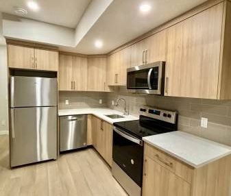 BRAND NEW 2 BED 2 BATH BASEMENT WITH DEDICATED PARKING, PRIVATE ENTRY, - Photo 4