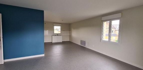 Au rez-de-chaussée d'un petit immeuble situé dans le bourg de SAINT-MARC-LE-BLANC, un apparteme... - Photo 2