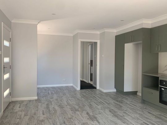 Near-new unit offering low-maintenance living - Photo 1