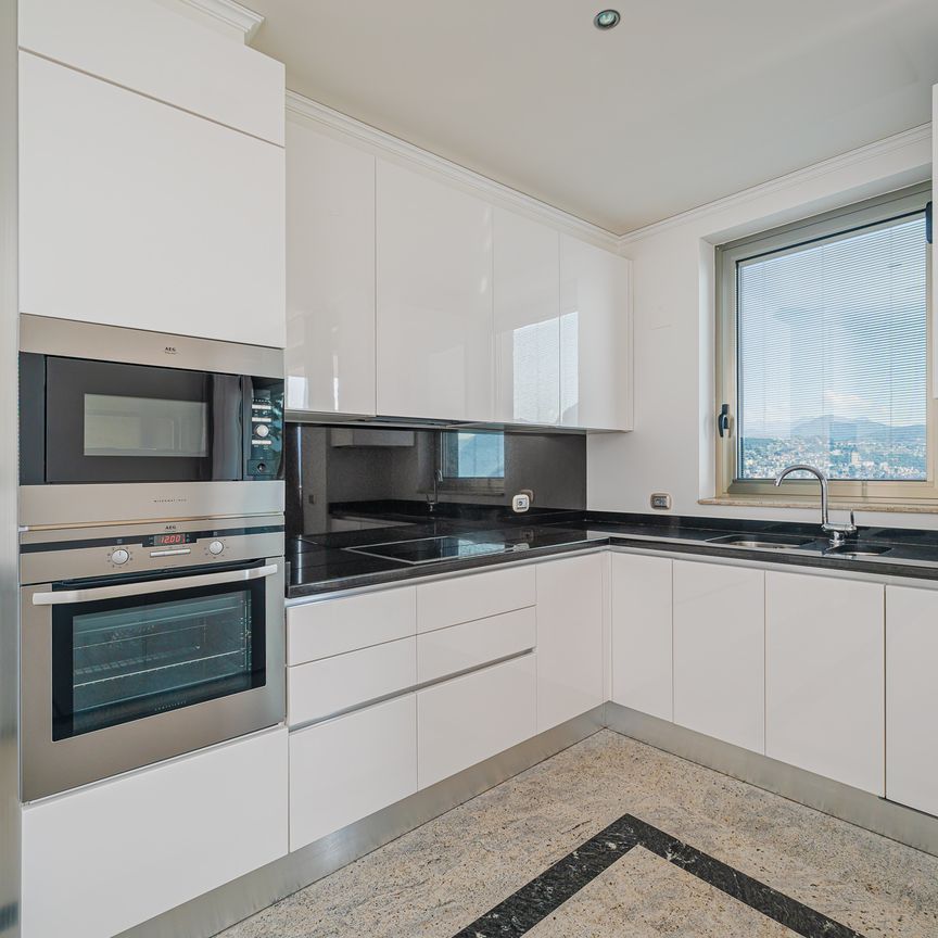 SPETTACOLARE 3.5 LOCALI AMMOBILIATO CON VISTA LAGO A PARADISO - Foto 1