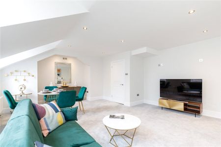 An impressive, modern two bedroom maisonette situated on the 3rd and 4th floors of this period building on the Chelsea/Earls Court borders. Council Tax Band F | EPC rating: D - Photo 2