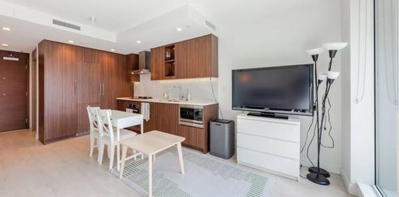 Vancouver Olympic Village furnished 1 Bedroom Plus 1 Den For Rent - Photo 2