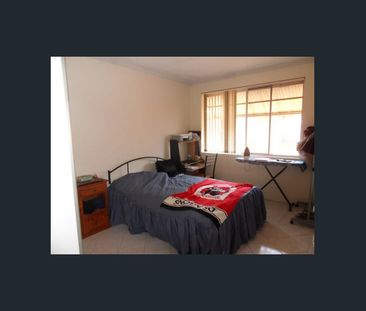 Top Floor Unit in a Great Location! - Photo 1