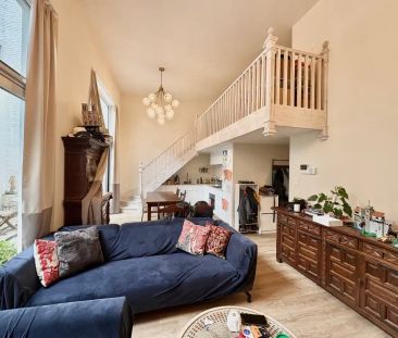 Sfeervol en ruim gelijkvloers 2-slaapkamerappartement met mezzanine - Photo 2