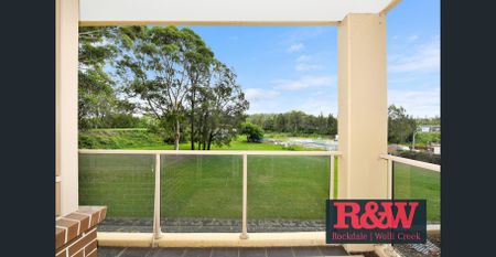 Unique Split Level Apartment with Study - Photo 2