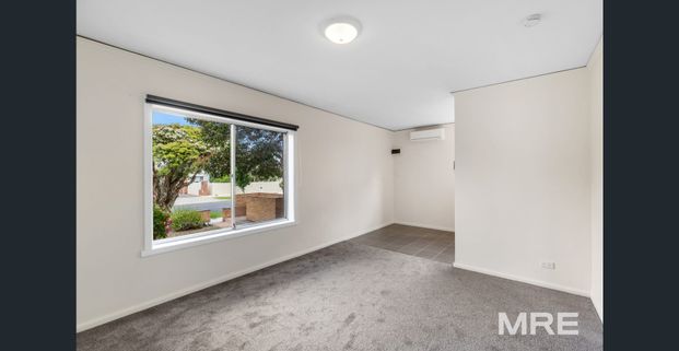 Convenient light filled ground-floor living - Photo 1
