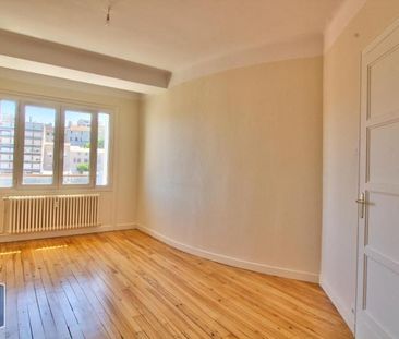 Location Appartement 4 pièces 110m² ST ETIENNE 42000 - Photo 3