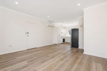 Modern and secure unit in prime location! - Photo 2