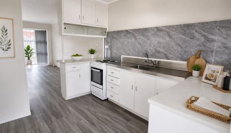 Freshly Renovated 3-Bedroom Unit in a Prime Location - Photo 2