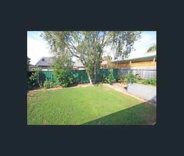 Well-Maintained Three-Bedroom Home - Photo 6