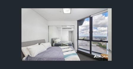 Sky-High Sophistication with Breathtaking River Views - Photo 2