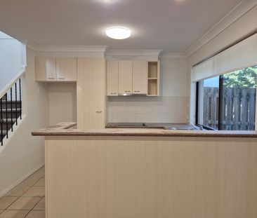 RENOVATED THREE BEDROOM TOWNHOUSE IN GATED COMPLEX WITH POOL LOCATE... - Photo 6