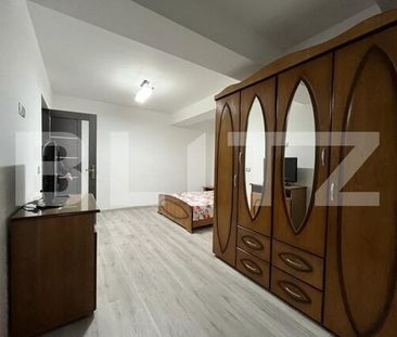 Apartament modern cu două camere, centrala si loc de parcare privat - Fotografie 1