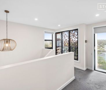 Tri-level townhouse with exceptional storage and style - Photo 1