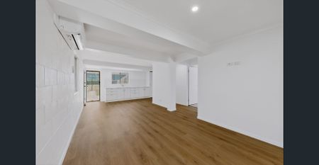 Spacious Renovated Home with Flexible Dual-Living Potential! - Photo 4