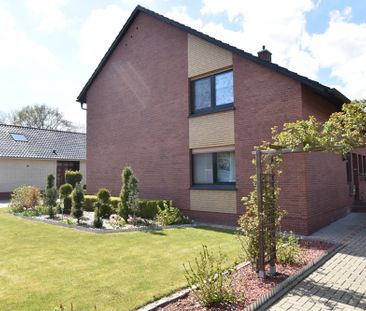 Erdgeschosswohnung mit Garage und Garten in schöner Wohnlage in Barßel - Foto 1