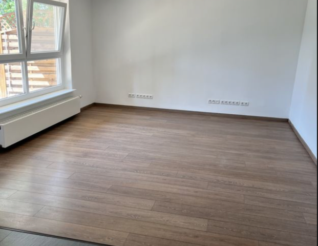 Geschmackvolle, geräumige EG-Wohnung mit zwei Zimmern - Foto 1