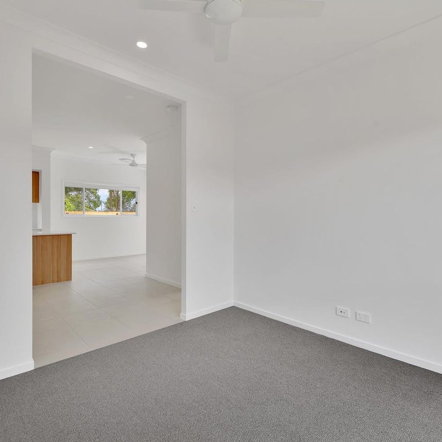 Modern Comfort and Convenience: Spacious 4-Bedroom Rental House in Logan Village - Photo 1