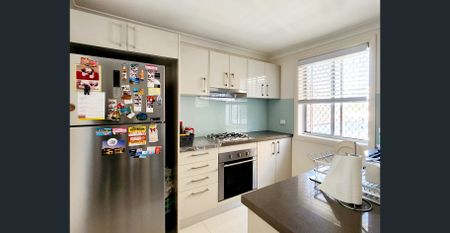 Near New Tri-level 2-bedroom Townhouse In Great Condition - Photo 2