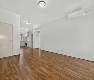Modern Two-Bedroom Unit with Courtyard! - Photo 2