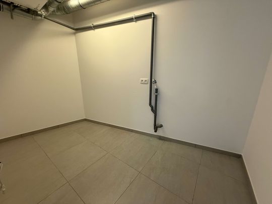 Nieuwbouwappartement met 3 slaapkamers, groot terras en autostaanplaats te huur in centrum Leuven - Photo 1
