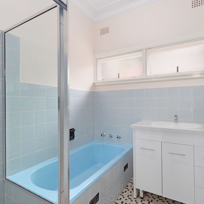 Effortless Family Living with Sunlit Spaces and Modern Comforts - Photo 1