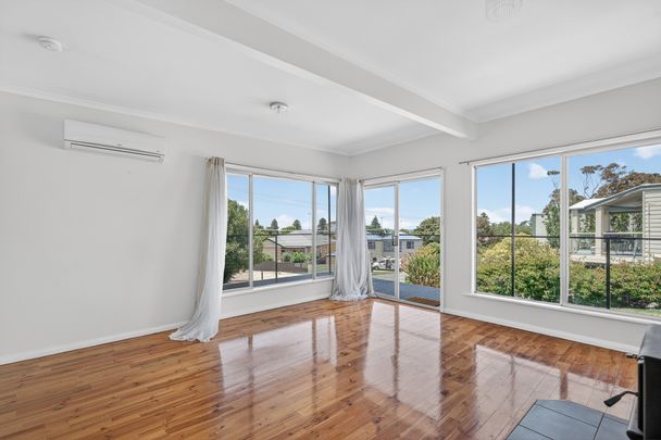 Open the Door to Elevated Coastal Living - Photo 1