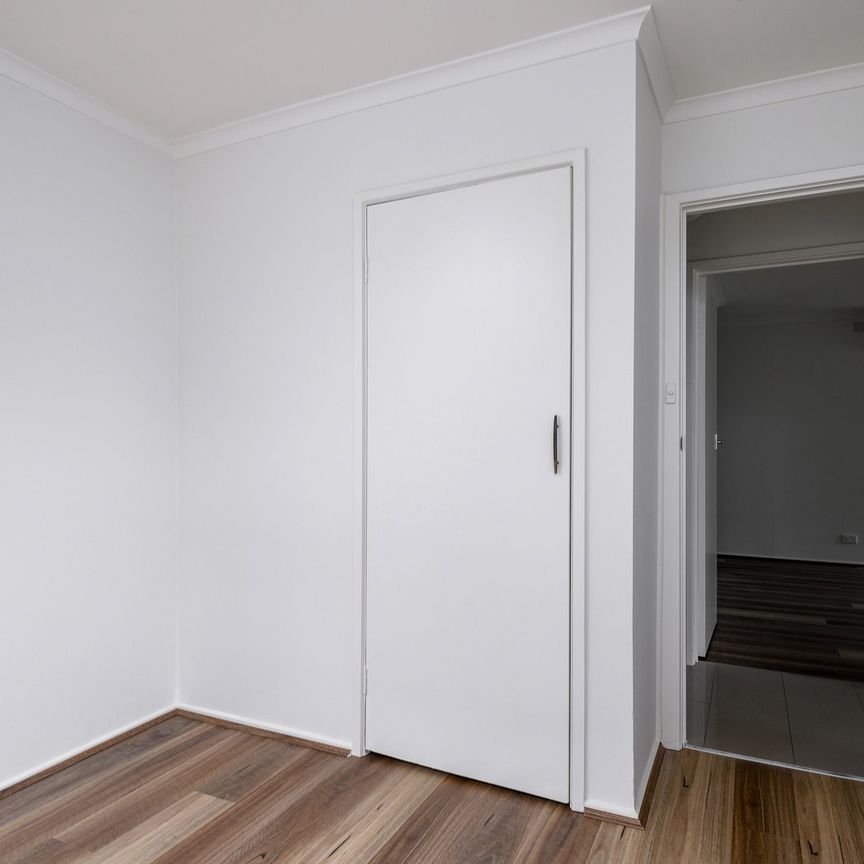TWO BEDROOM SPACIOUS UNIT WITH DOUBLE GARAGE - Photo 1