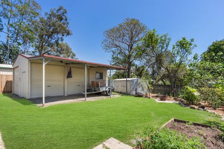 A Perfect Family Home with a Shed, Carports and Outdoor Oasis - Photo 3