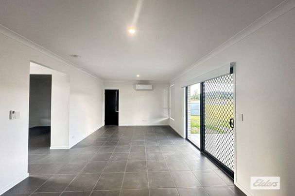 This stunning 18 Month home is available for rent! - Photo 1