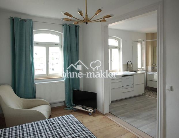 stylishe Wohnung zum Hof - Foto 1
