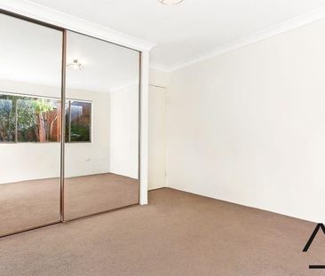 Centrally Located Two Bedroom Security Apartment with Single Garage - Photo 4