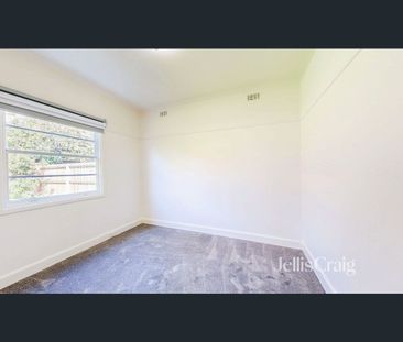 Beautifully Renovated Home with Multiple Living Spaces & Expansive ... - Photo 6