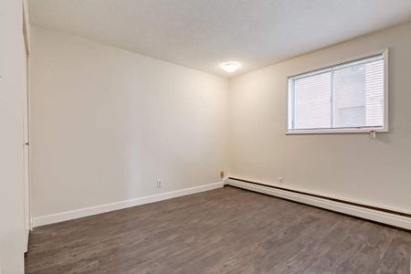 Renovated Suite - 2 Bedroom - Photo 2