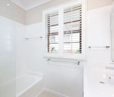 Elegant Stucco Double Brick Home with Character and Modern Comfort - Photo 3