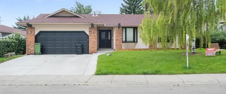 Stunning Legalized 2-bed + Den Basement Suite with Private Entrance | Calgary - Photo 1